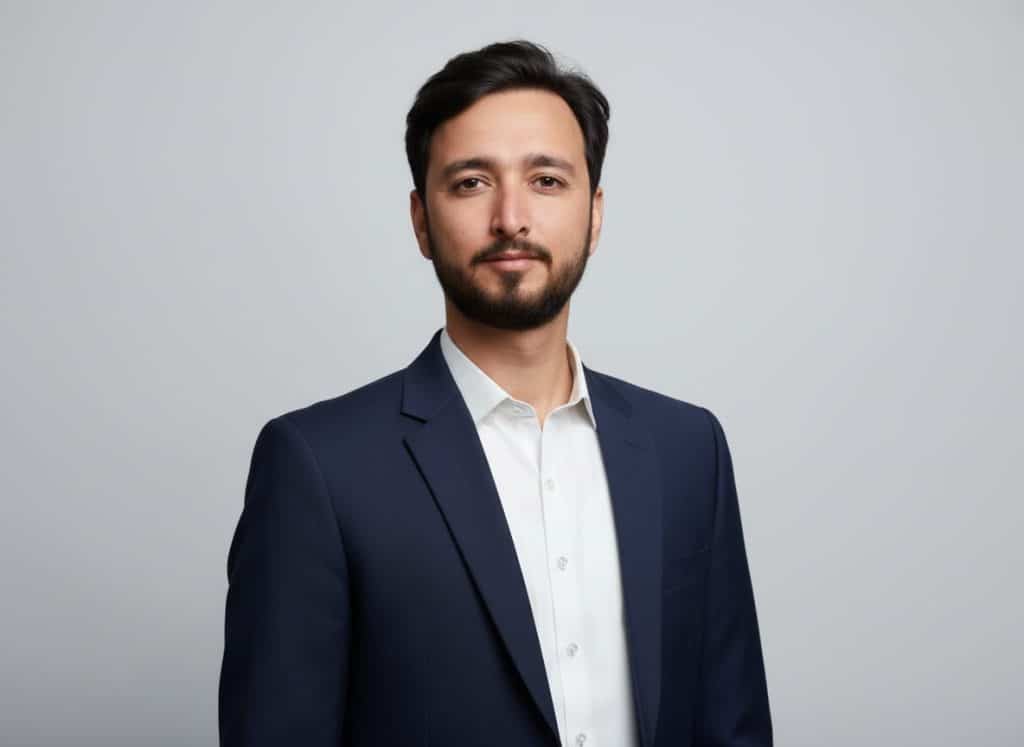 Naveed Tariq, founder of The Web Zone, in a navy blazer