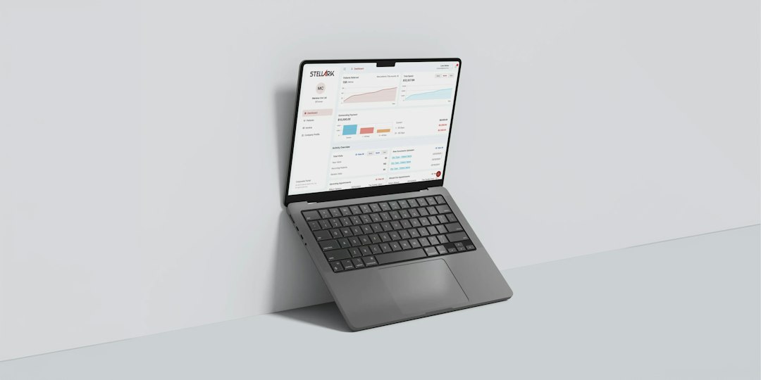Laptop displaying a web analytics tools dashboard with key performance metrics